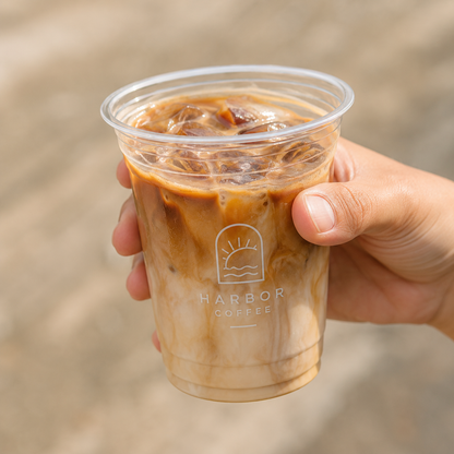 Custom 92mm clear PET cold cup with iced latte and white logo printing