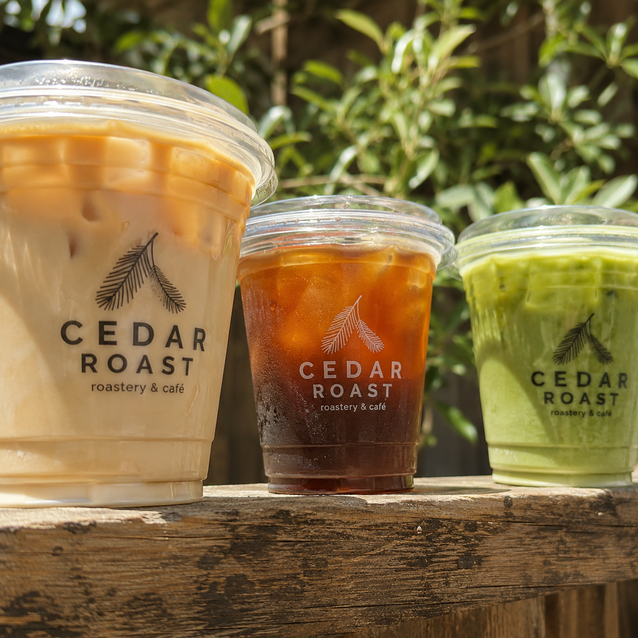 Custom 95mm PET cold cups with printed logos for iced coffee tea and matcha drinks