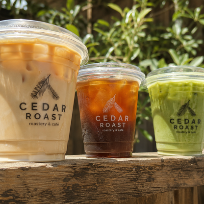 Custom 95mm PET cold cups with printed logos for iced coffee tea and matcha drinks