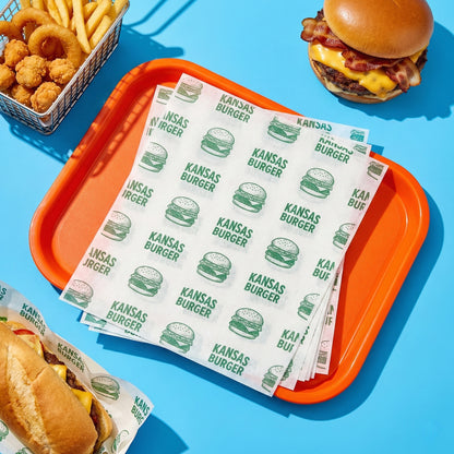 Custom size greaseproof paper sheets for restaurant and takeaway food packaging