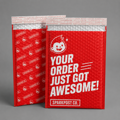 Red custom printed bubble mailers with bold ecommerce branding for padded shipping packaging.