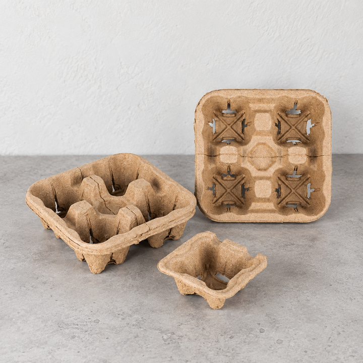 Four-cup molded pulp drink carrier shown from above and below with a separated single-cup holder